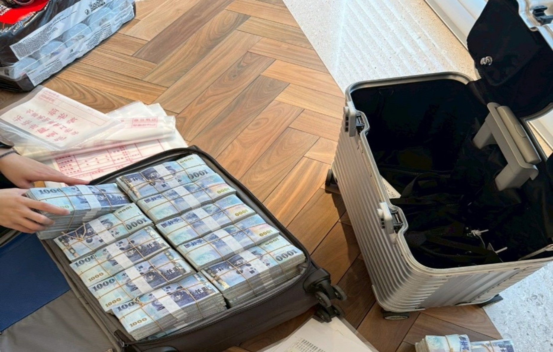 Cash seized at the search site
